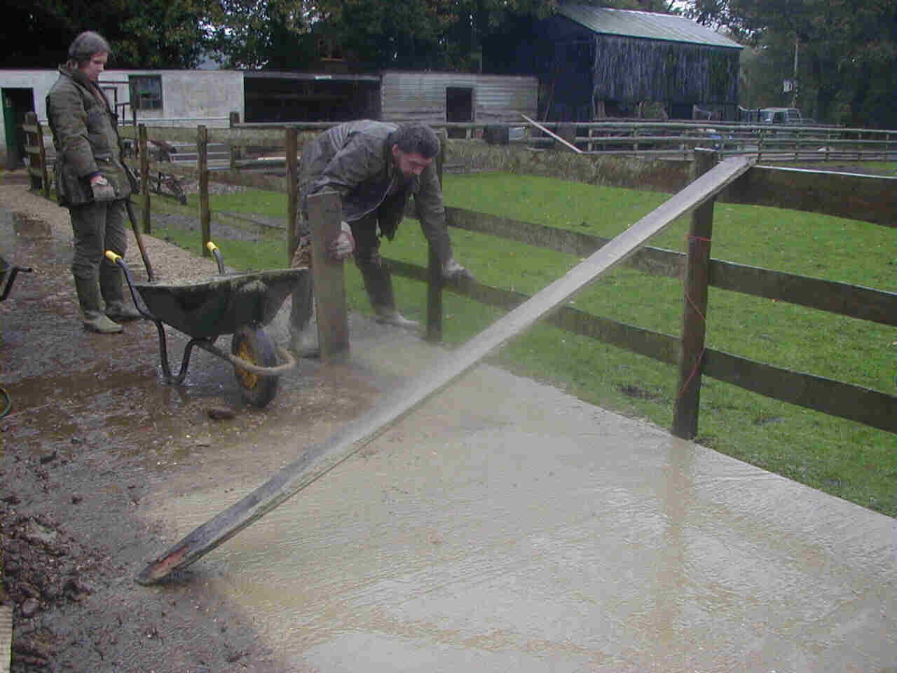 Laying concrete in pouring rain